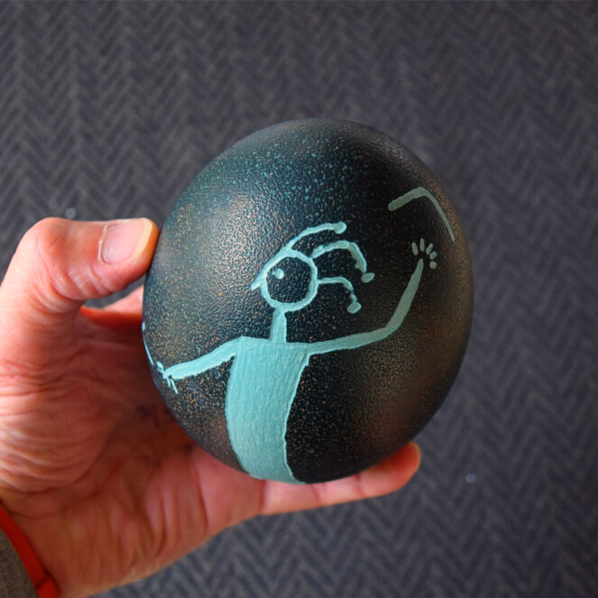 EMU EGG CARVED, MAN HUNTING KANGAROO